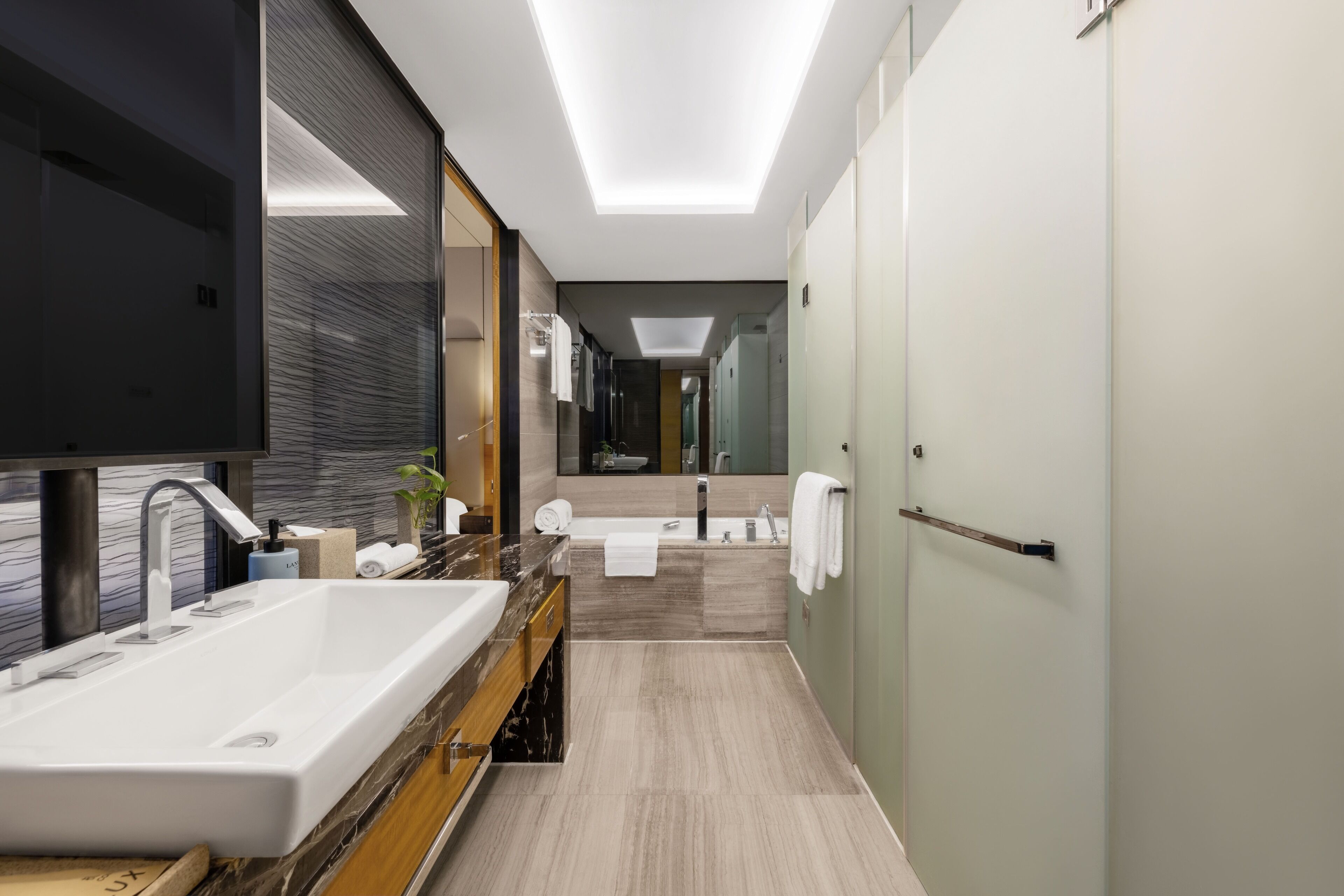 superior room twin | bathroom | shower, designer toiletries, hair dryer, bathrobes