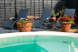 Indoor pool, outdoor pool, sun loungers - The Empire Hotel & Spa (Llandudno)