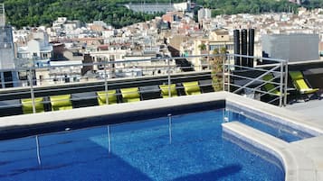 Seasonal outdoor pool, open 8:00 AM to 8:00 PM, sun loungers