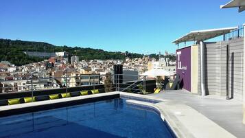 Seasonal outdoor pool, open 8:00 AM to 8:00 PM, sun loungers