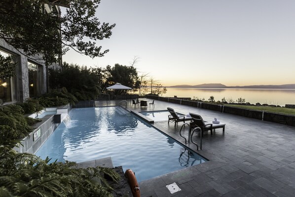 Indoor pool, outdoor pool, pool umbrellas