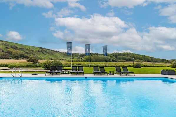 Seasonal outdoor pool, pool umbrellas, sun loungers