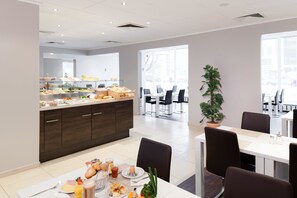 Daily buffet breakfast (EUR 18 per person)