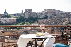 Standard Double Room, City View | Balcony view - Hotel Minerva (Siena)