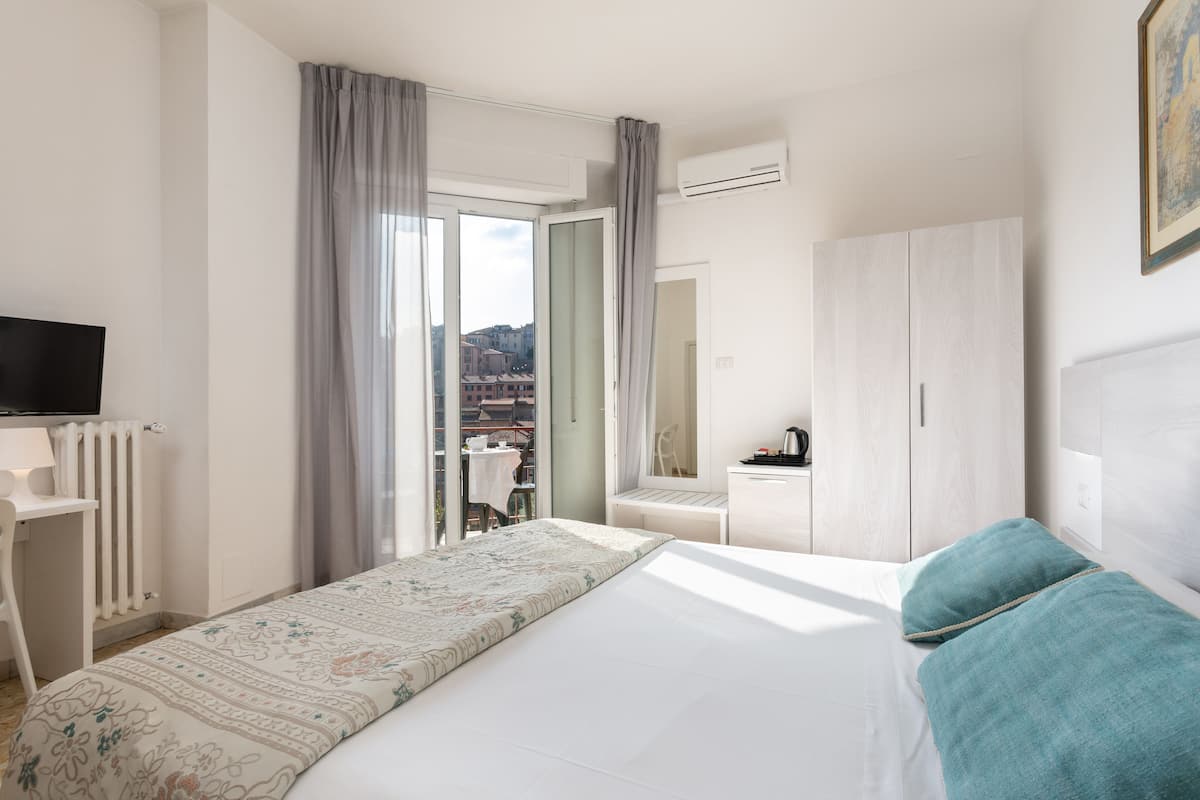 standard double room, city view | egyptian cotton sheets, premium bedding, minibar, in-room safe