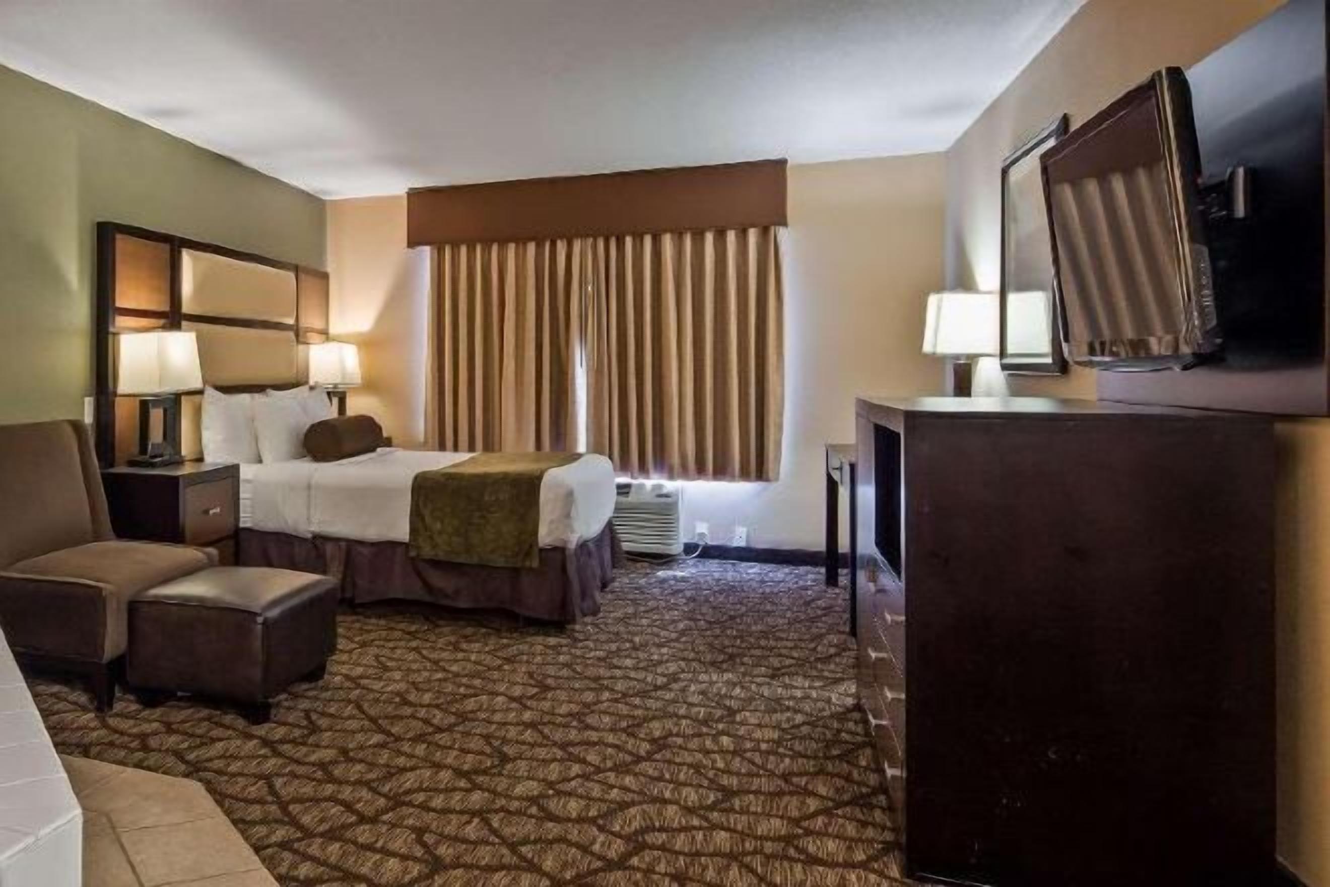 Blackout drapes, iron/ironing board, free cribs/infant beds