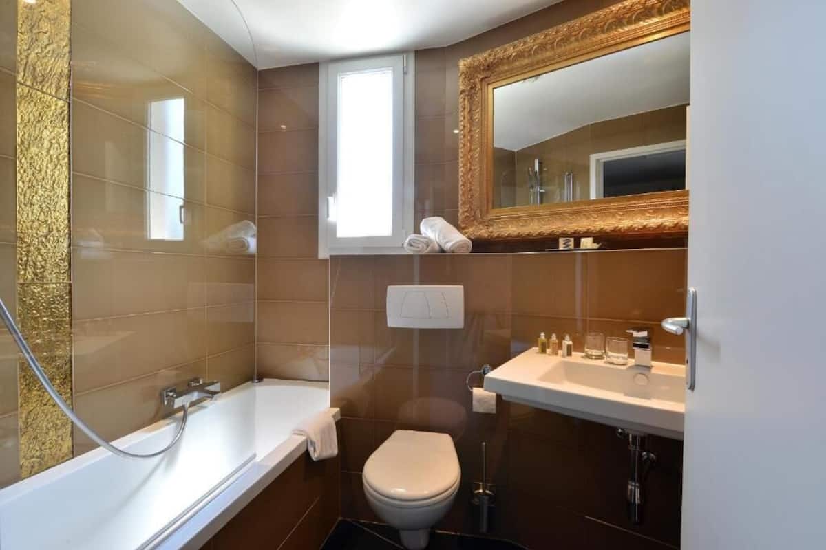 room, garden view | bathroom | designer toiletries, hair dryer, bathrobes, slippers