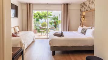 Chambre Exécutive, terrasse | Literie de qualité supérieure, minibar, coffres-forts dans les chambres