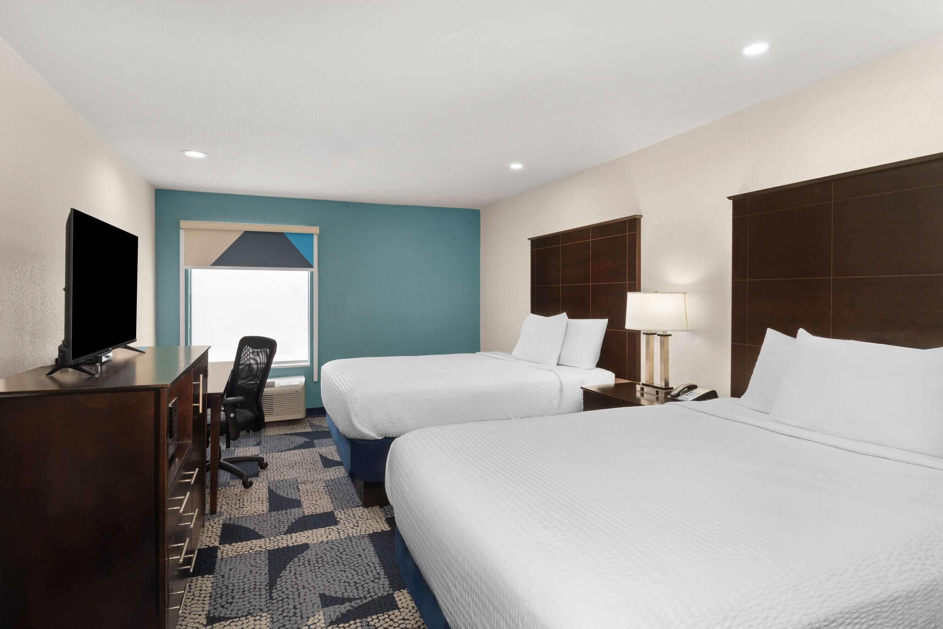 Room, 2 Queen Beds, Non Smoking | In-room safe, desk, laptop workspace, iron/ironing board