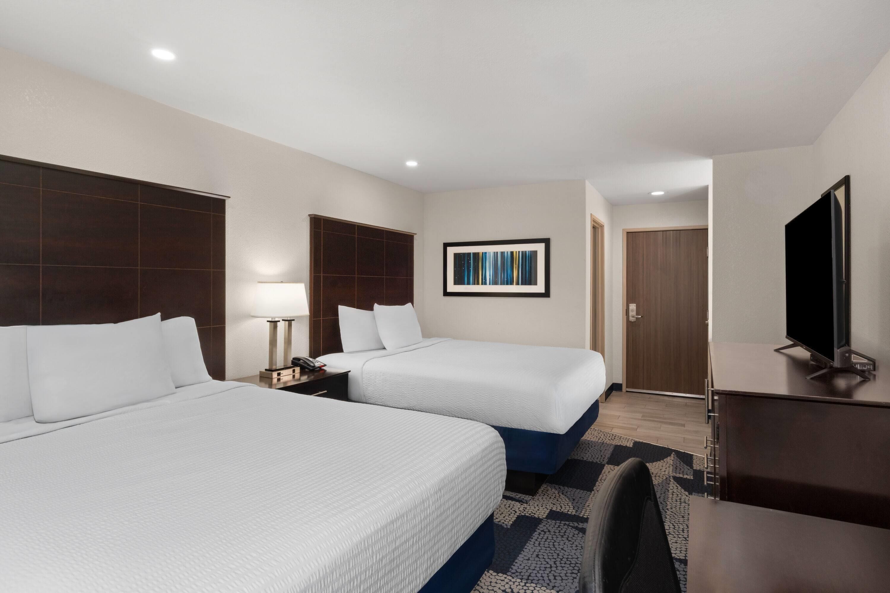 Room, 2 Queen Beds, Non Smoking | In-room safe, desk, laptop workspace, iron/ironing board