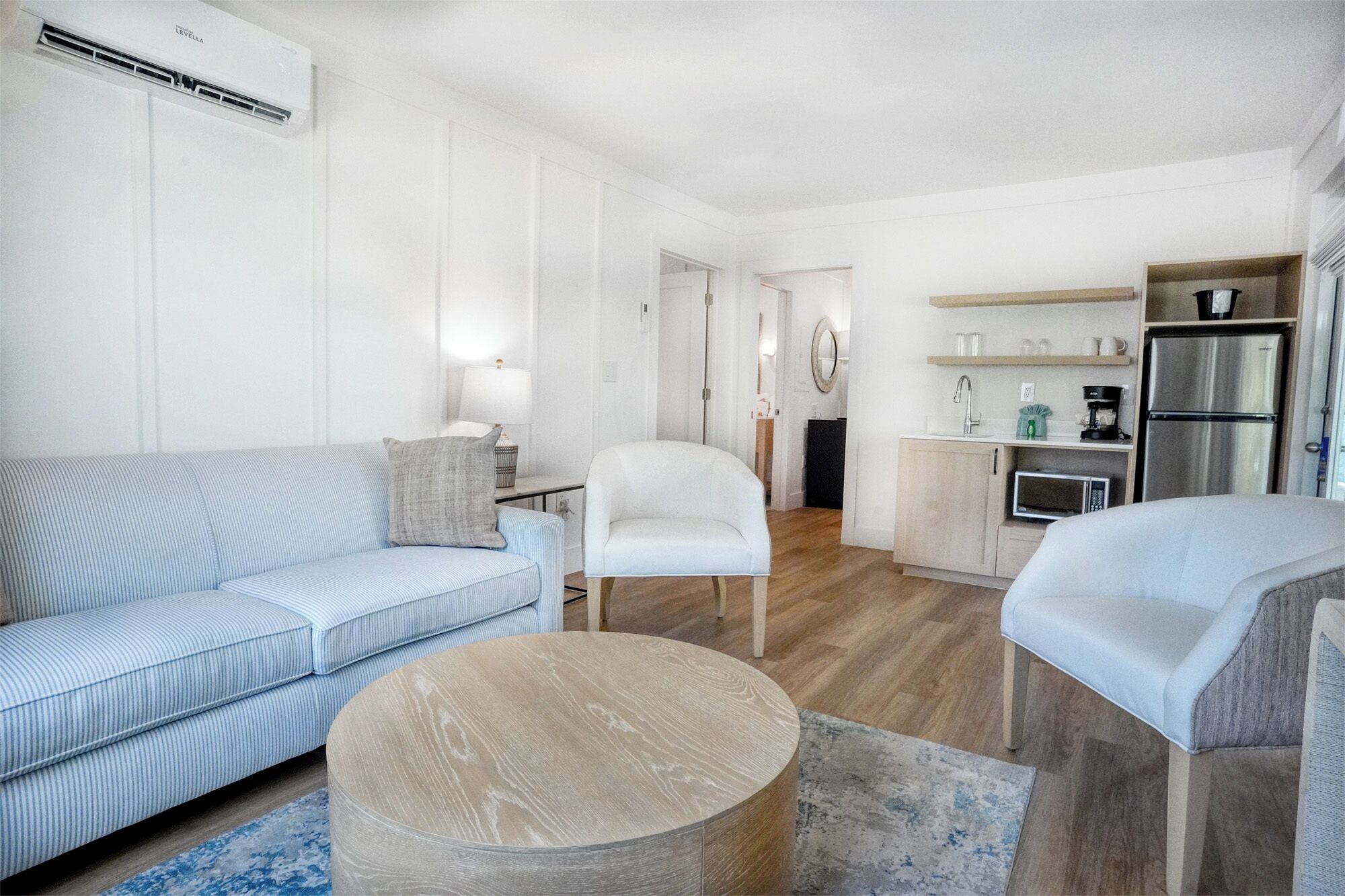 offshore king, 2 bedrooms(family suite, not pet friendly) | living area | 50-inch tv with cable channels