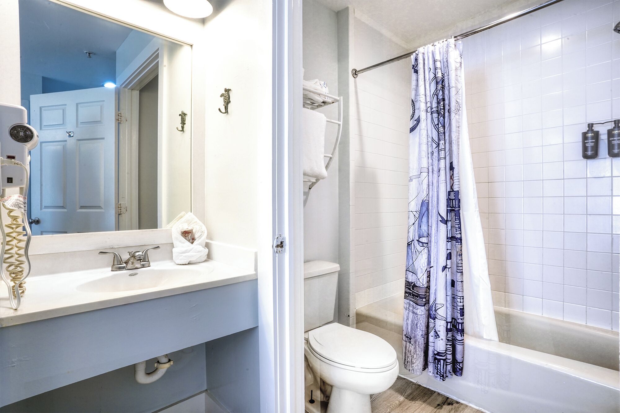business suite, 1 king bed | bathroom | shower, hair dryer, towels