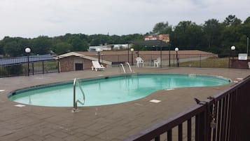 Seasonal outdoor pool, open 10 AM to 10 PM, pool loungers