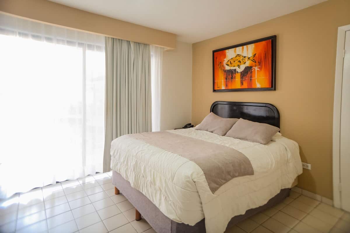 Minibar, blackout curtains, soundproofing, iron/ironing board