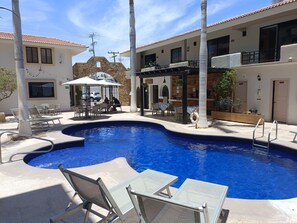 Outdoor pool, open 9:00 AM to 9:00 PM, pool umbrellas, pool loungers - Hotel Santa Fe by Villa Group (Cabo San Lucas)