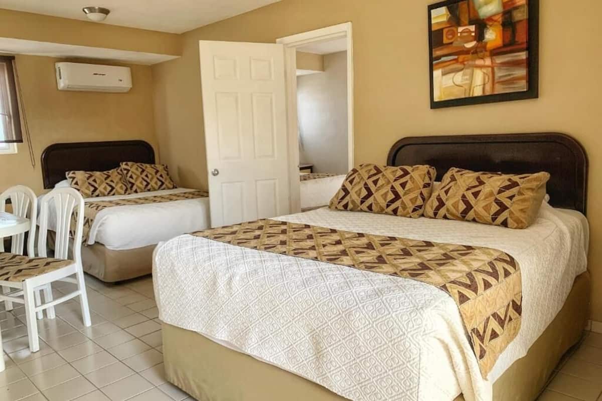 Minibar, blackout curtains, soundproofing, iron/ironing board