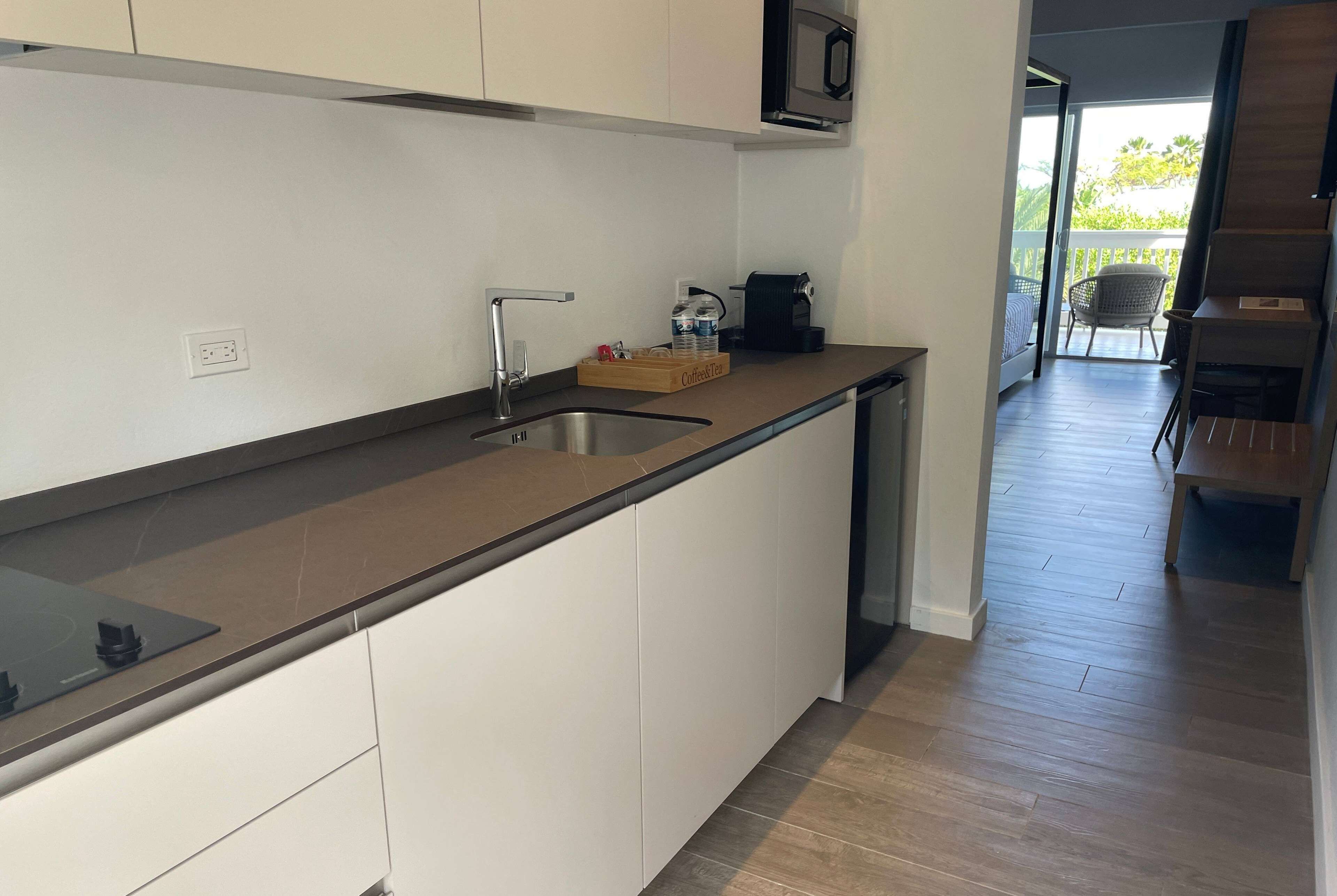 studio, 2 queen beds, poolside | in-room safe, individually decorated, individually furnished, desk