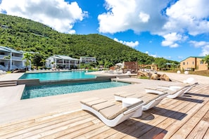 Outdoor pool, free cabanas, pool umbrellas