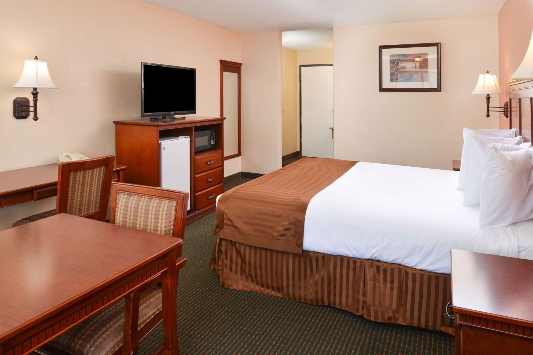 Desk, blackout drapes, iron/ironing board, rollaway beds
