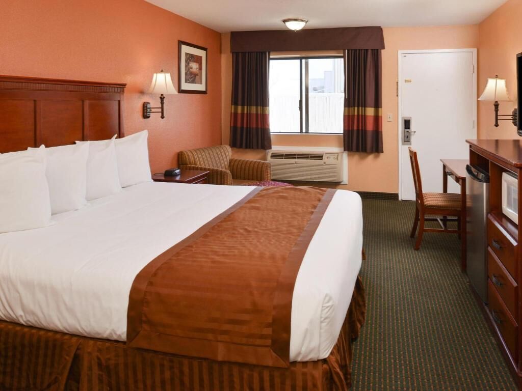 Desk, blackout drapes, iron/ironing board, rollaway beds