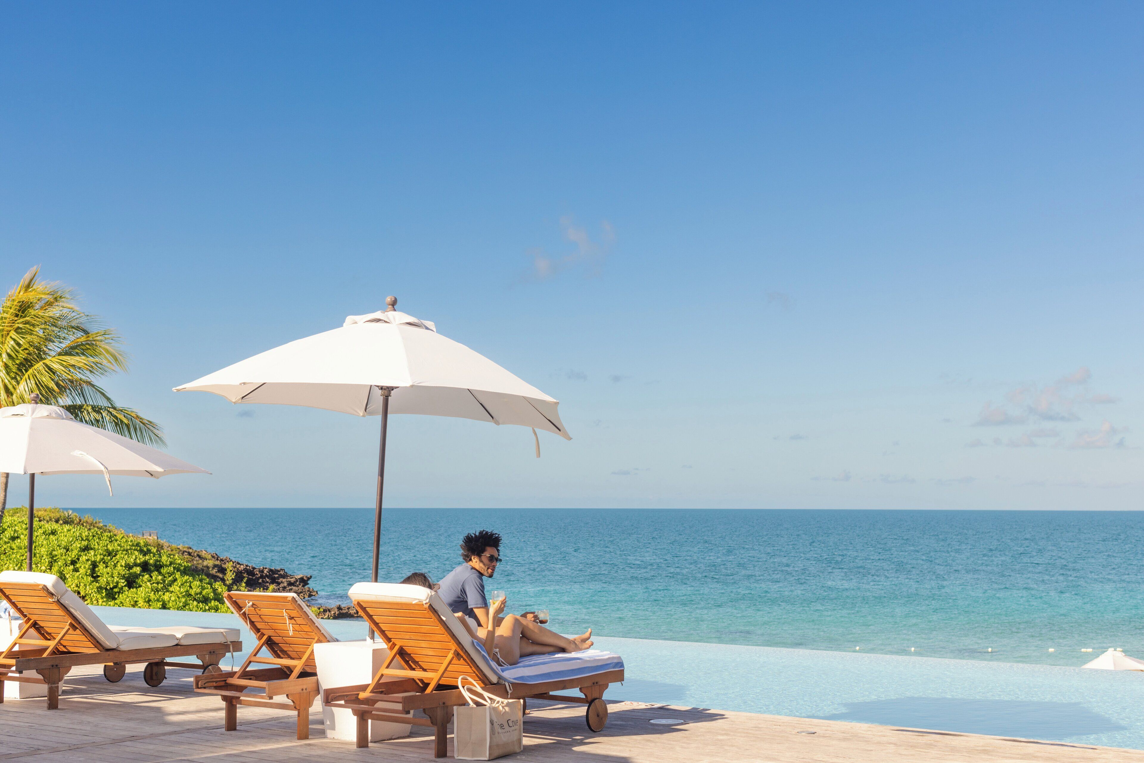 outdoor pool, pool umbrellas, pool loungers