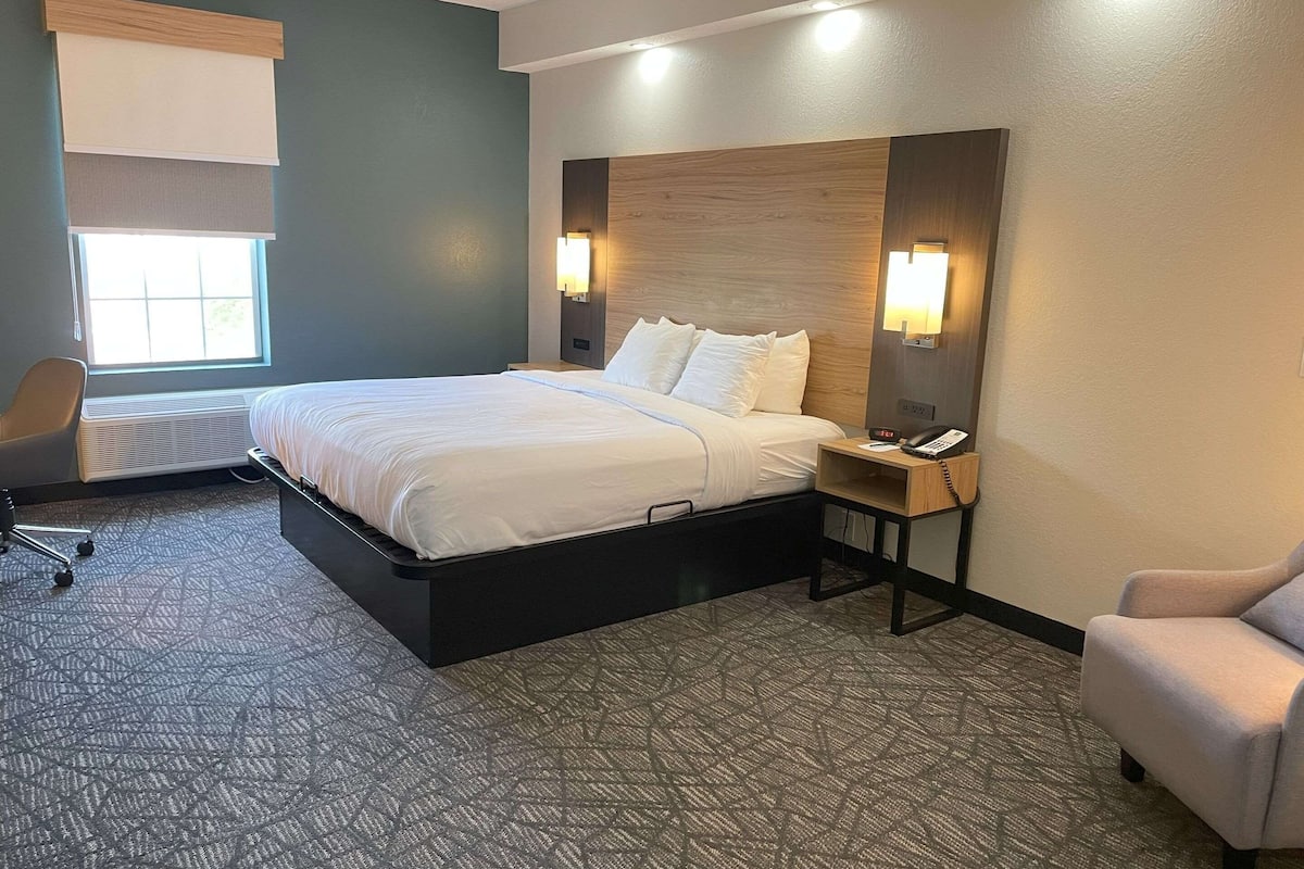 Premium bedding, pillow-top beds, desk, laptop workspace