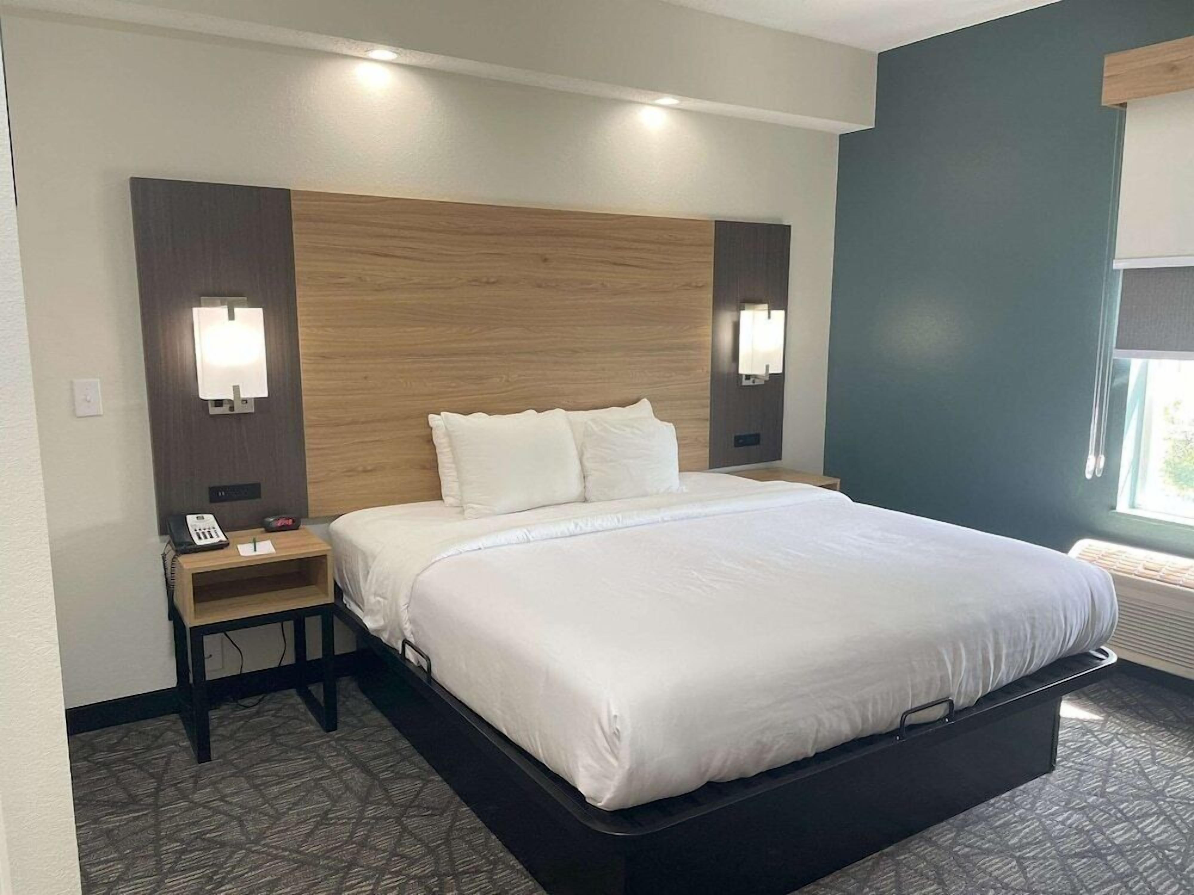 Premium bedding, pillowtop beds, desk, laptop workspace