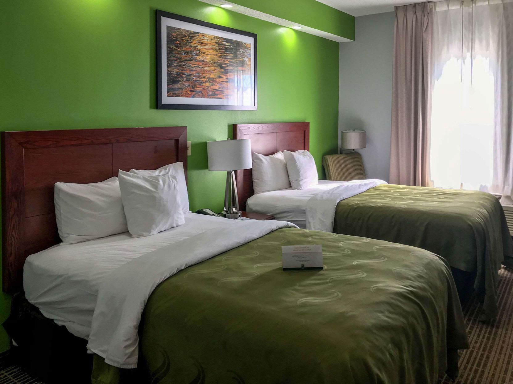 Premium bedding, pillowtop beds, desk, laptop workspace