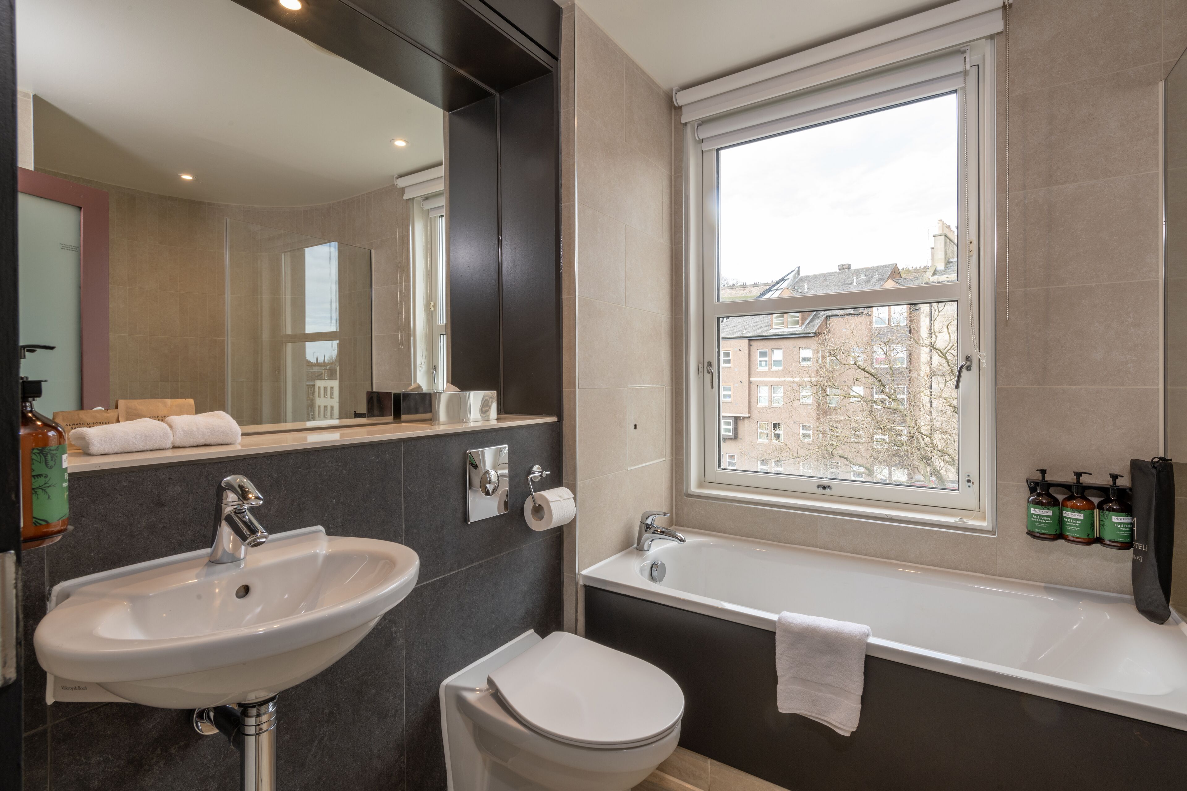 castle view twin room | bathroom | designer toiletries, hair dryer, towels