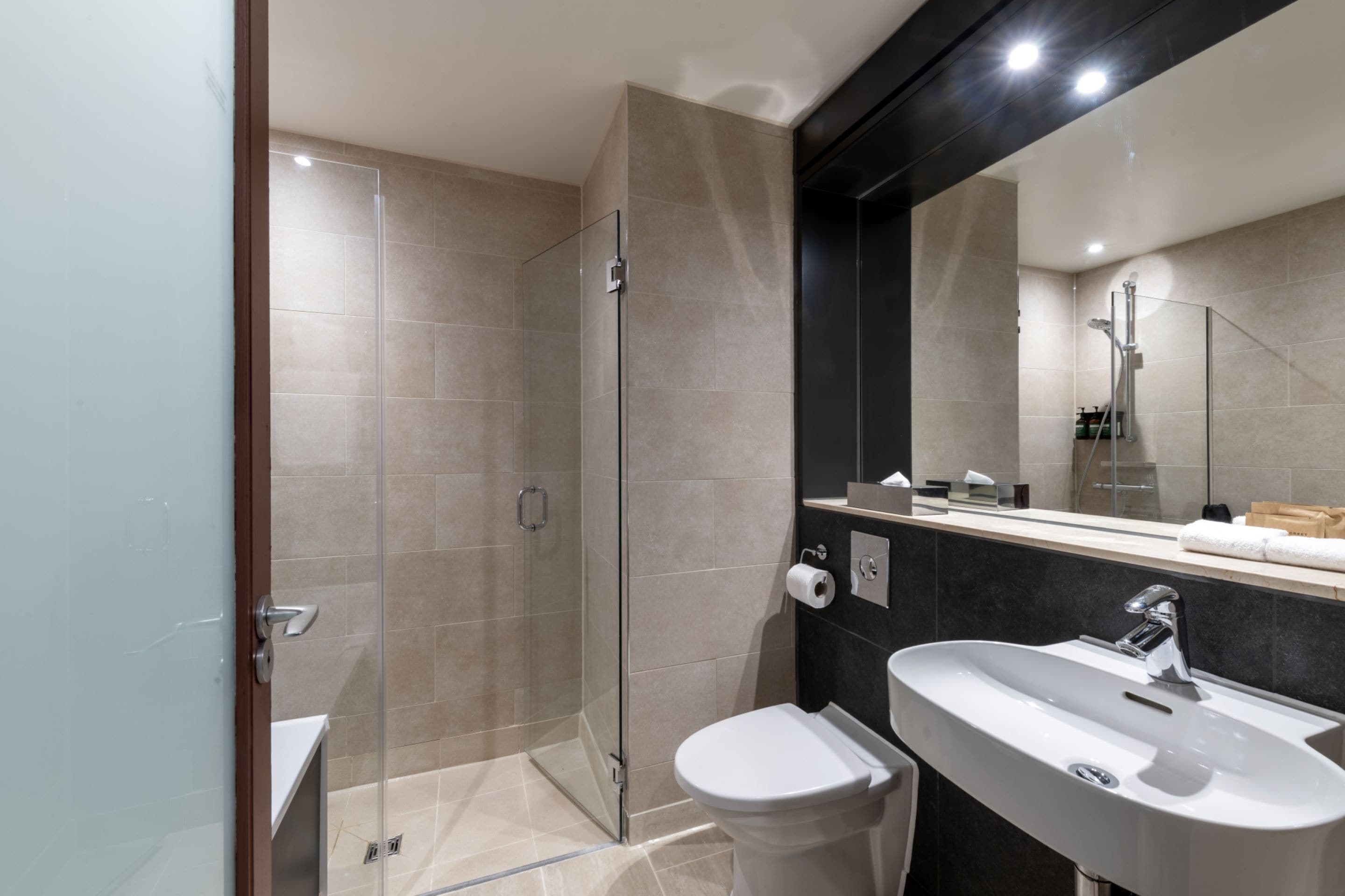 family room | bathroom | designer toiletries, hair dryer, towels