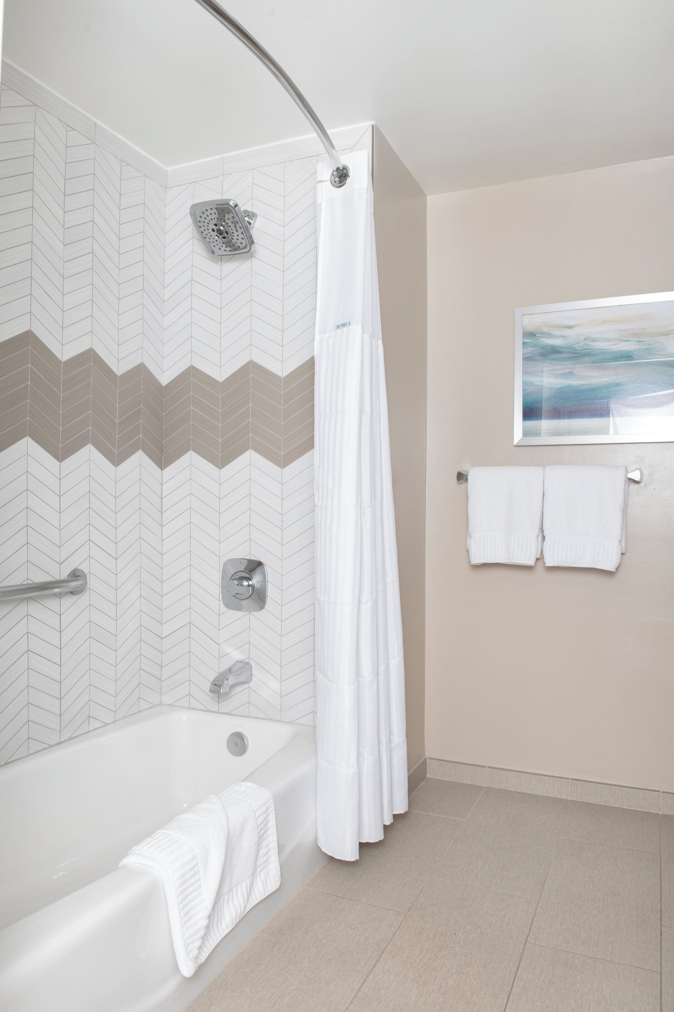 deluxe studio, 1 king bed with sofa bed, non smoking | bathroom | shower, free toiletries, hair dryer, towels