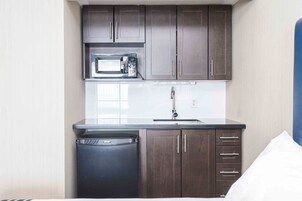 Standard Room, 2 Queen Beds, Kitchenette | Individually decorated, desk, laptop workspace, iron/ironing board