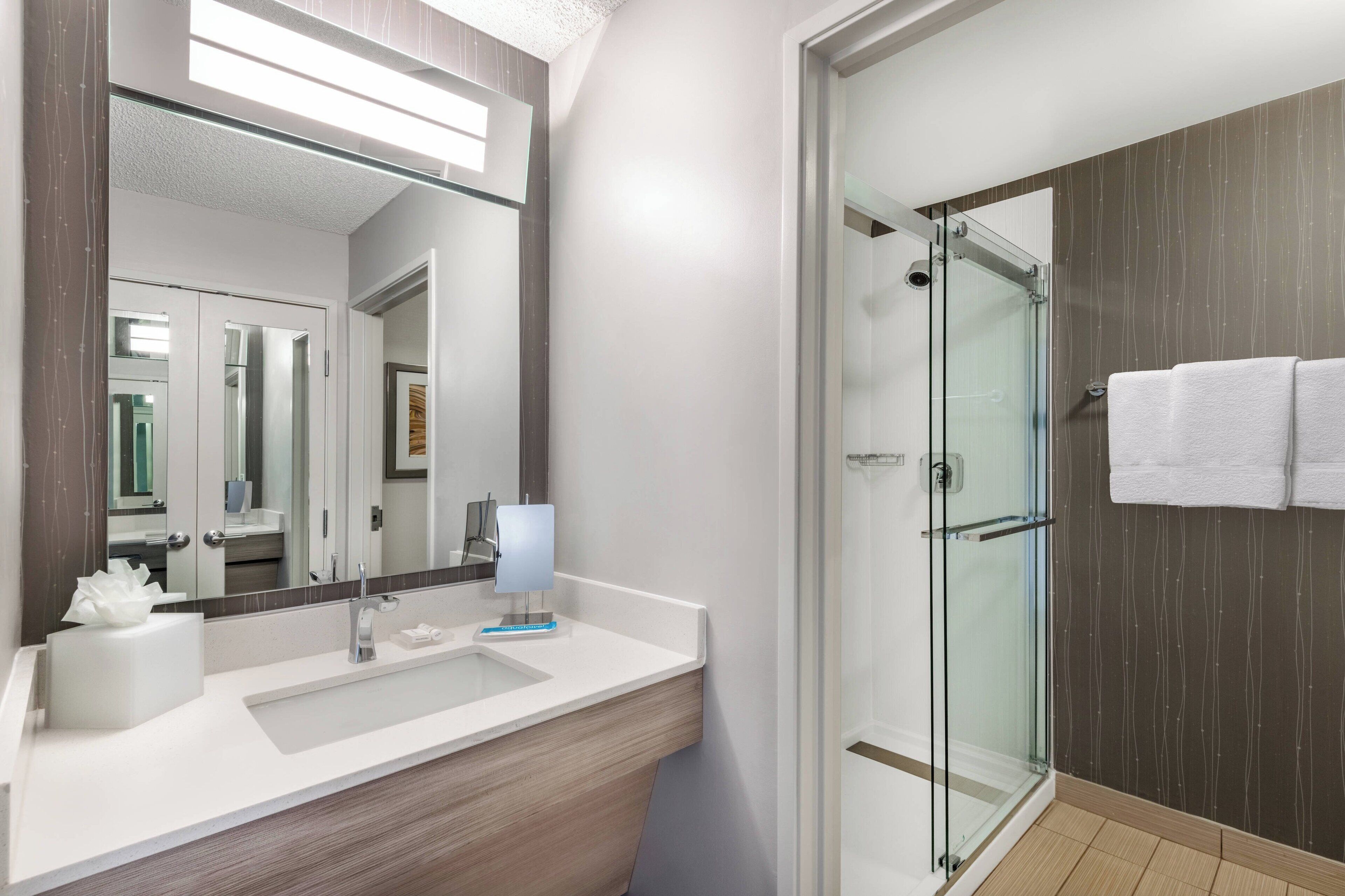 free toiletries, hair dryer, towels, toilet paper