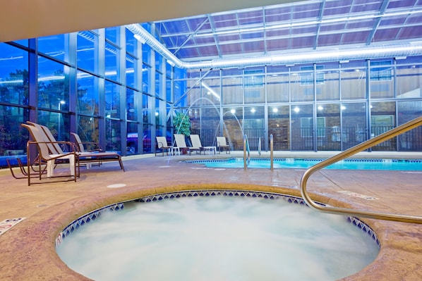 Indoor pool, open 9:00 AM to 9:00 PM, pool loungers