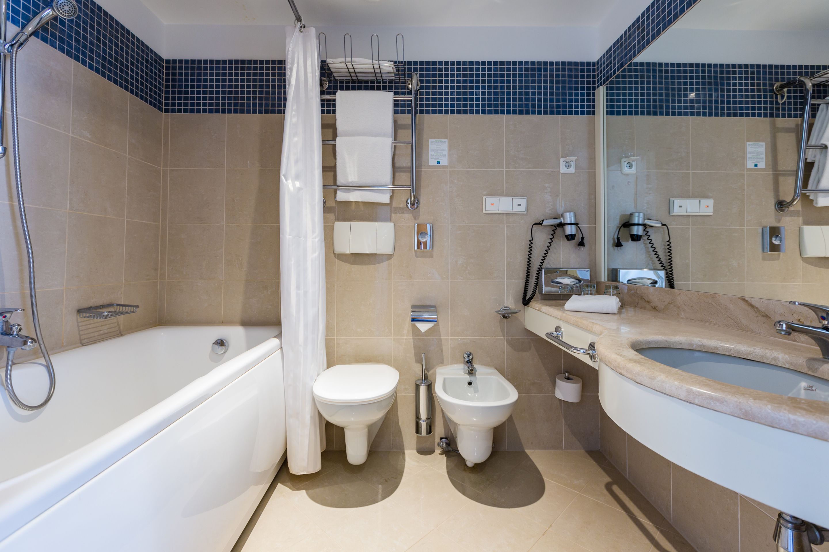 deluxe double room | bathroom | free toiletries, hair dryer, towels