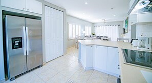 Family Condo, 2 Bedrooms | Private kitchen | Fridge, microwave, oven, stovetop