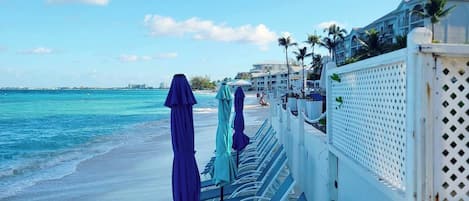 Beach nearby, white sand, free beach shuttle, beach umbrellas