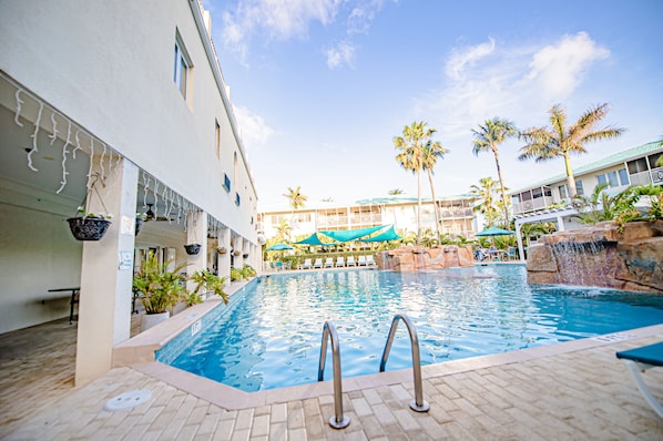 Outdoor pool, open 7:30 AM to 10 PM, pool umbrellas, pool loungers