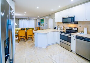 Family Condo, 2 Bedrooms | Private kitchen | Fridge, microwave, oven, stovetop