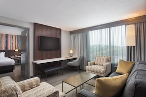 Suite, 1 Bedroom | Living area | 32-inch Smart TV with cable channels, TV, Netflix