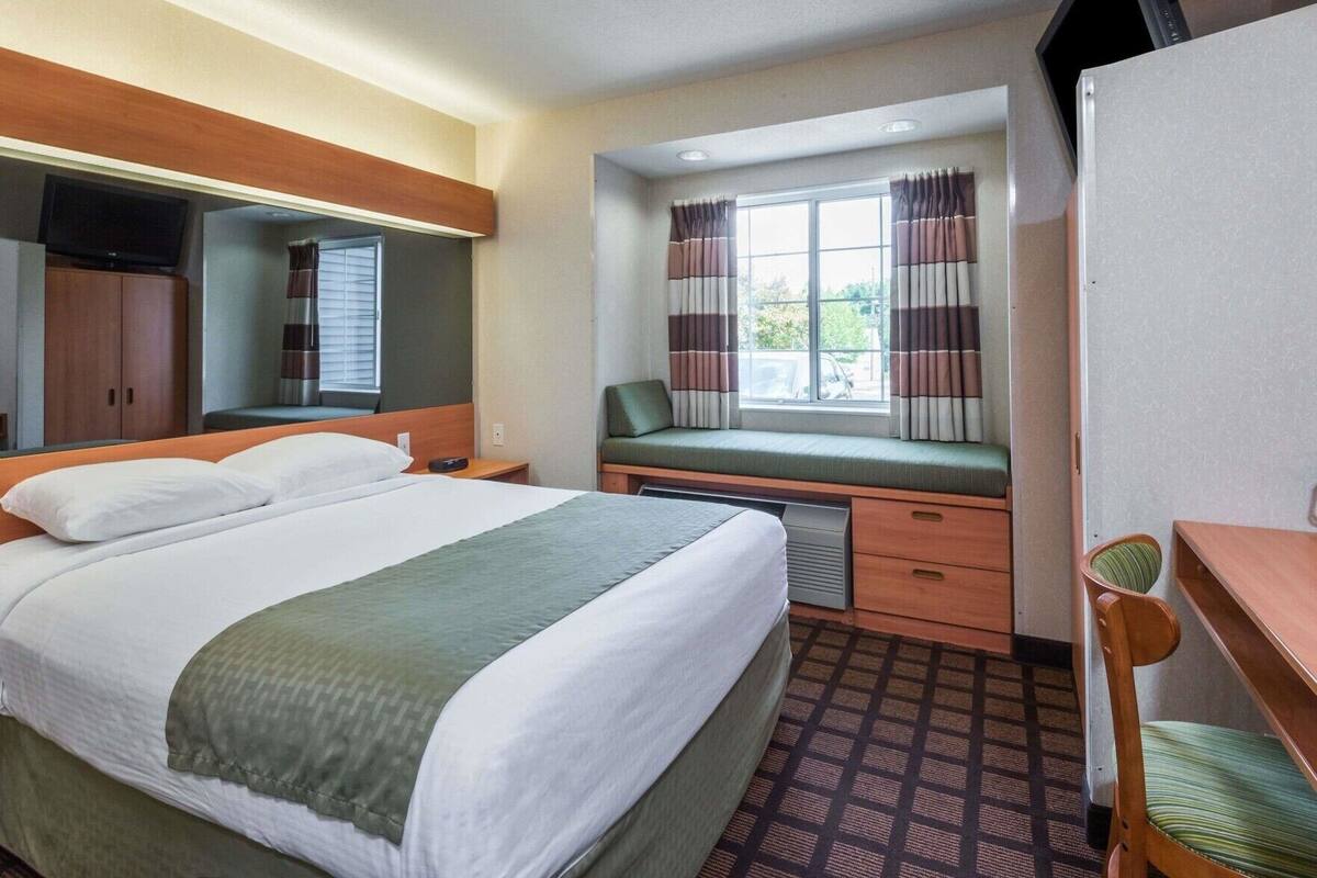 In-room safe, desk, laptop workspace, blackout curtains