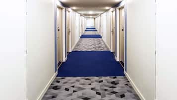 Desk, soundproofing, iron/ironing board, free cribs/infant beds