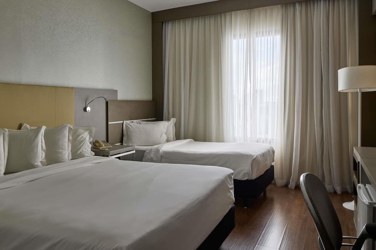 Superior Room, Multiple Beds | Minibar, in-room safe, desk, blackout curtains