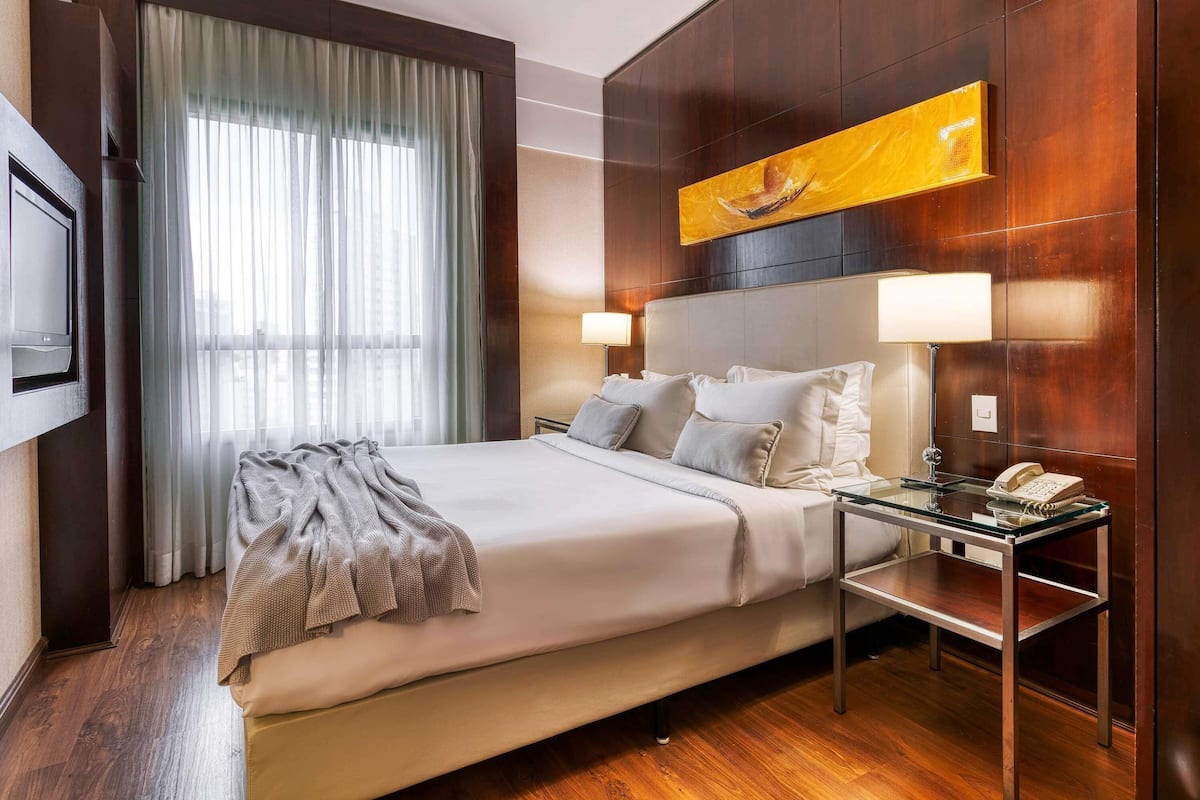 Junior Suite, 1 Double Bed | Minibar, in-room safe, desk, blackout drapes