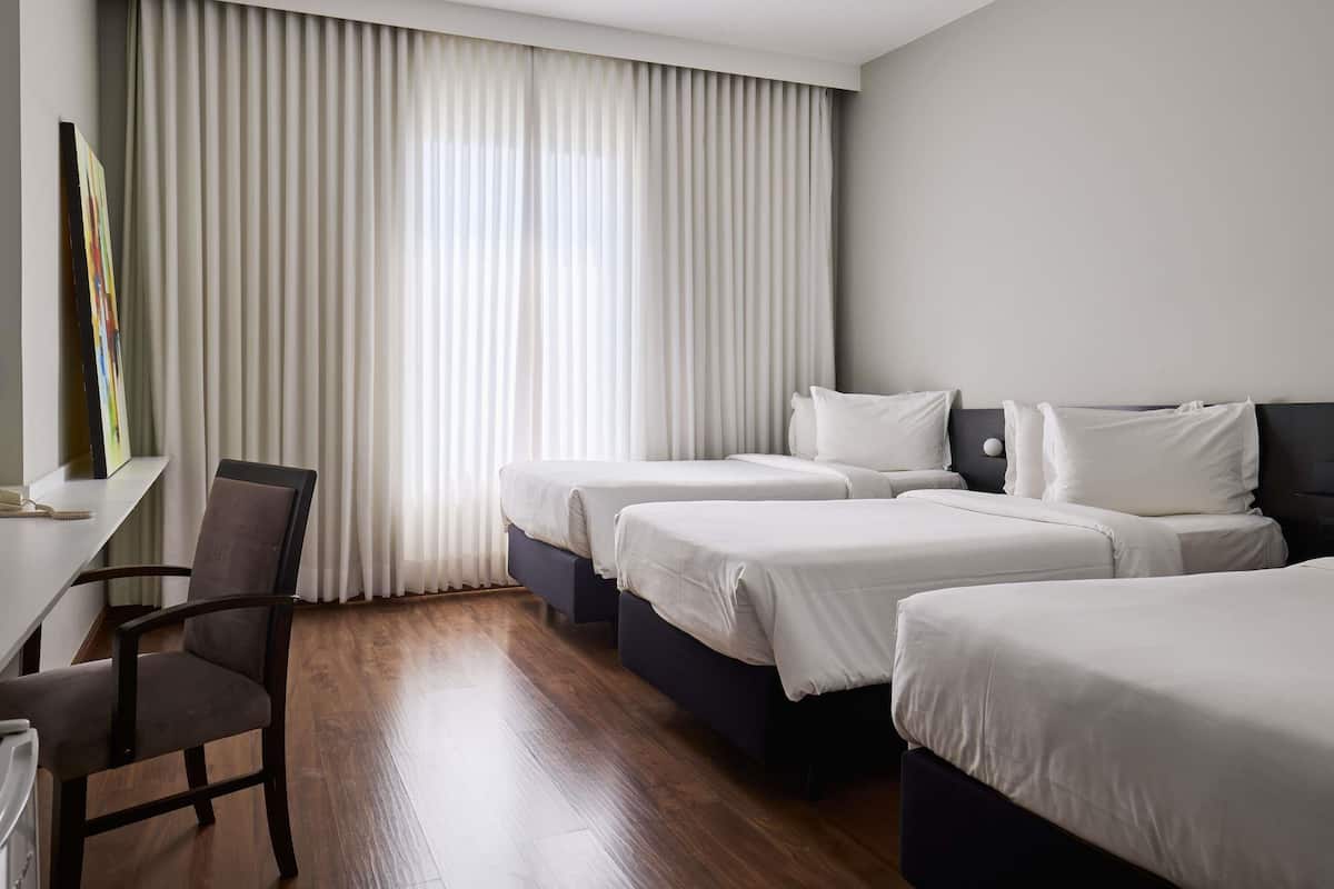 Standard Room, 3 Twin Beds | Minibar, in-room safe, desk, blackout drapes