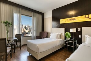 Classic Room, 3 Single Beds | Minibar, in-room safe, desk, blackout curtains