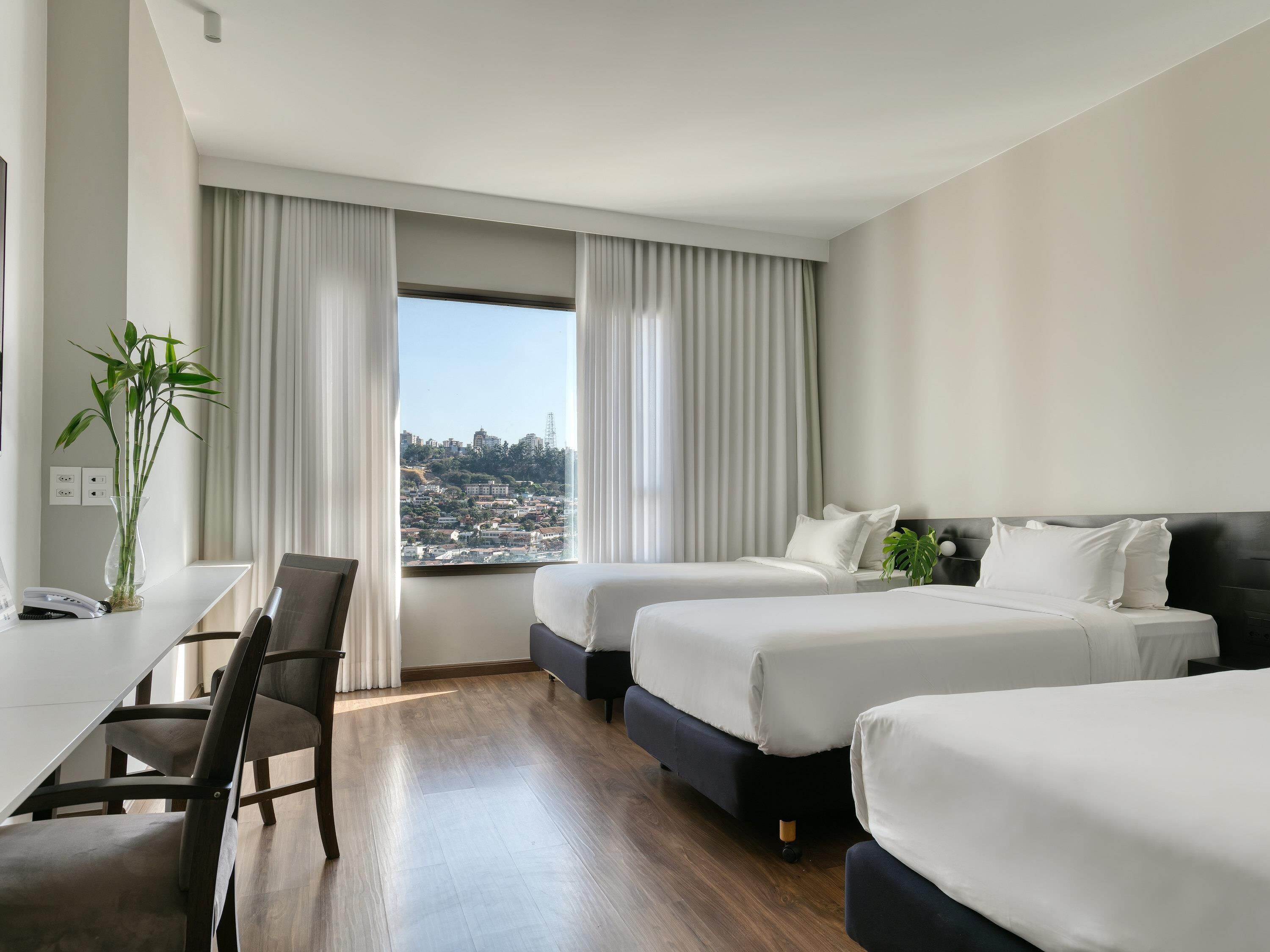 Standard Room, 3 Twin Beds | Minibar, in-room safe, desk, blackout drapes