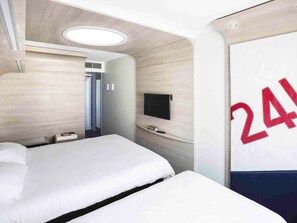 Premium bedding, blackout curtains, soundproofing, iron/ironing board