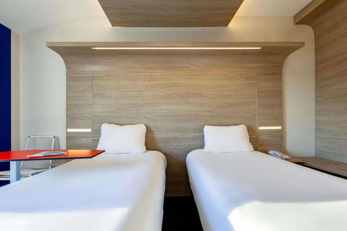 Quarto standard, 2 camas de solteiro | Roupas de cama premium, cortinas blackout, quartos à prova de som