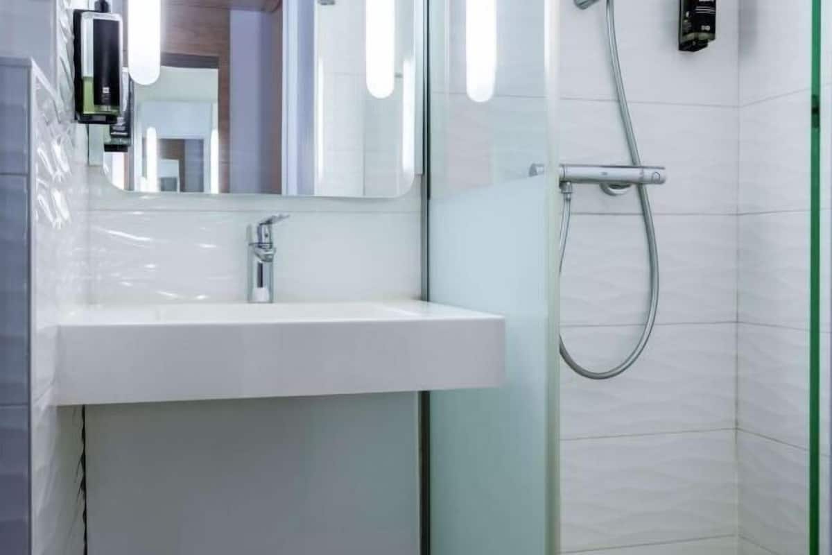 Bathroom | Shower, eco-friendly toiletries, hair dryer, towels